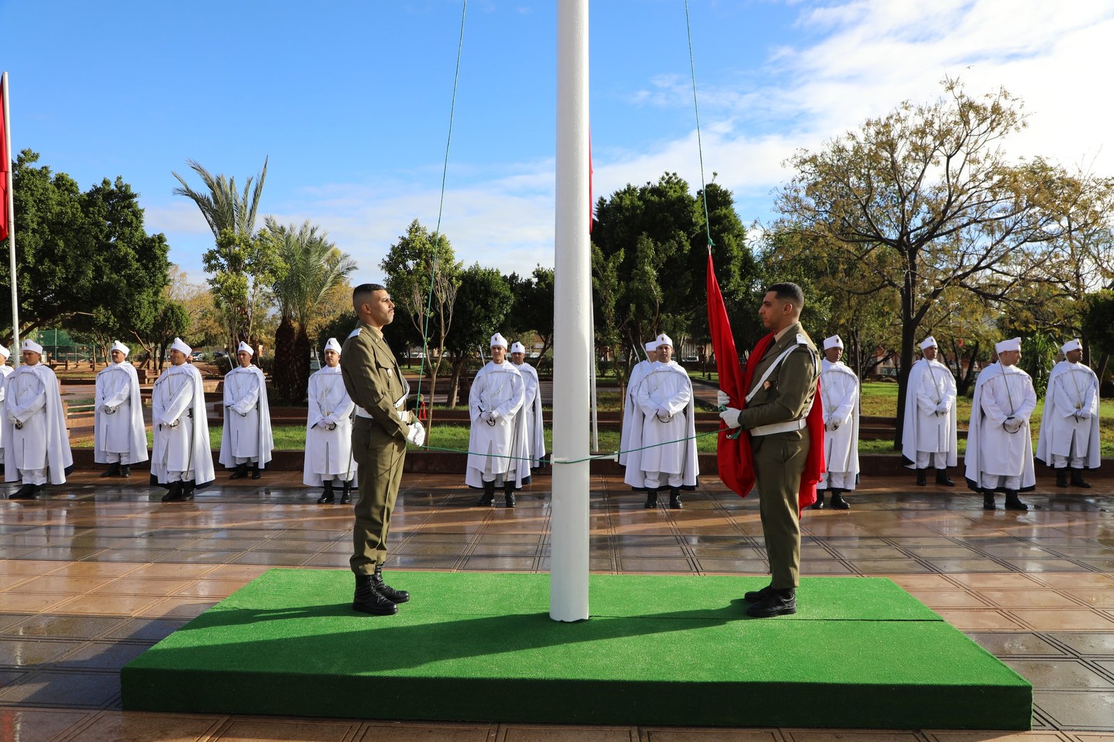 مراسيم تحية العلم الوطني احتفاءً بالذكرى السبعين لعيد الإستقلال المجيد